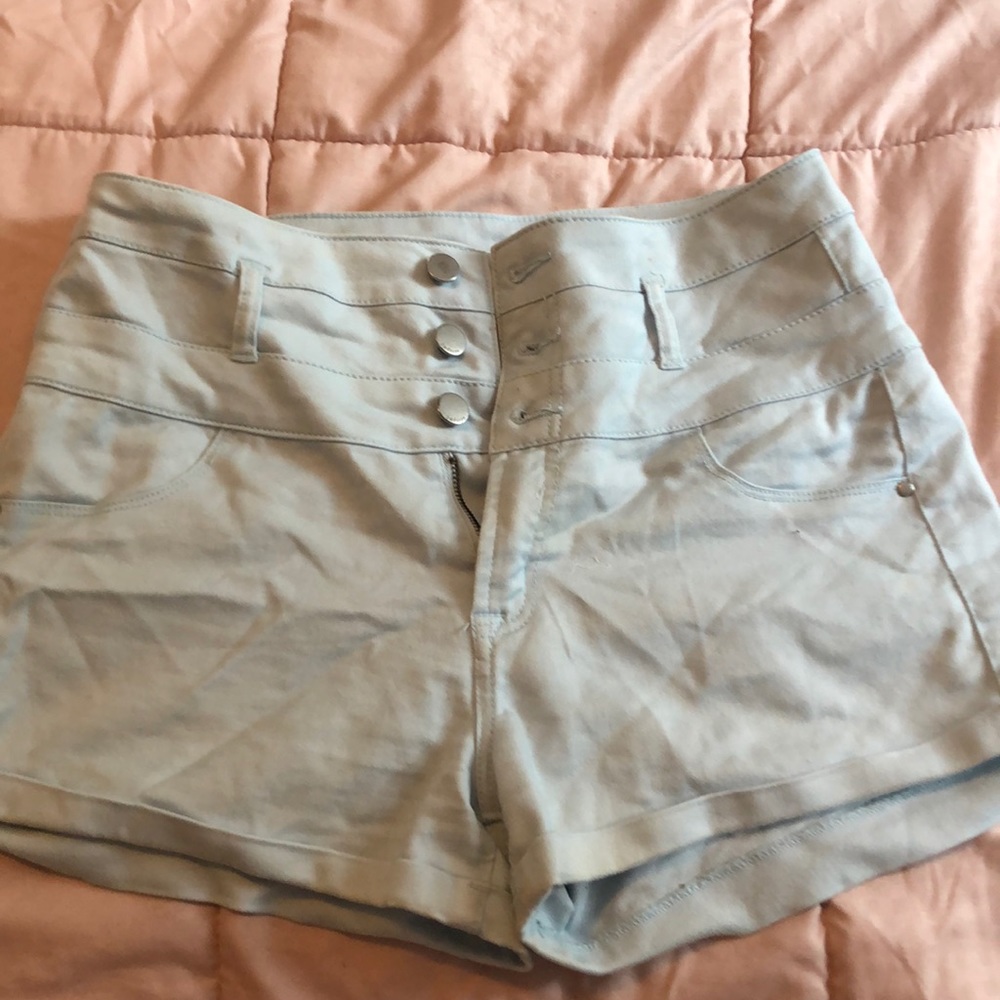 Worn, in good condition light blue shorts